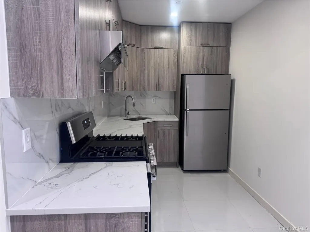 124-28 Queens Boulevard Kew Gardens NY 11415