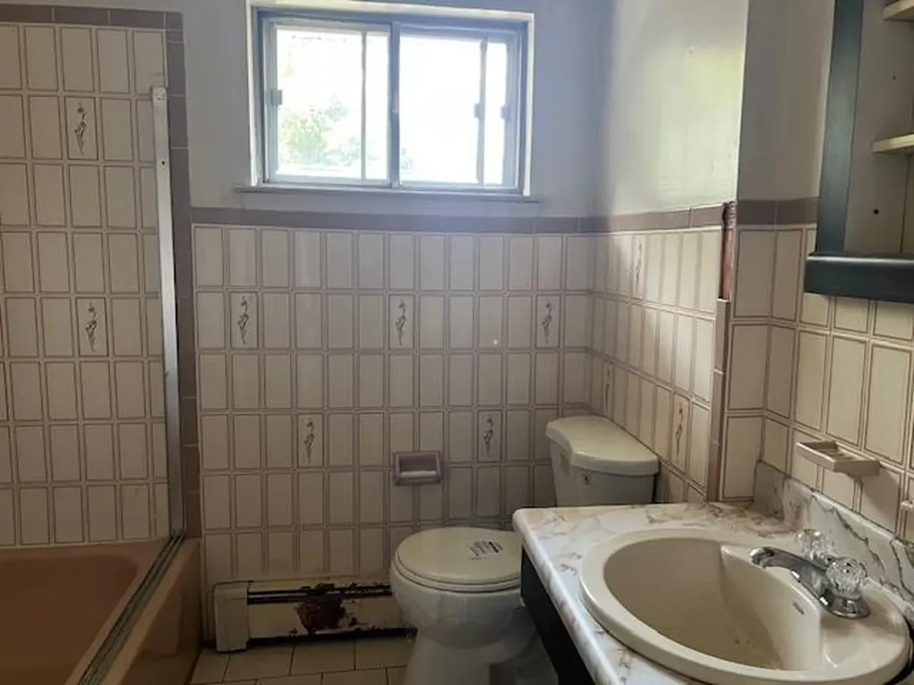 87 W Clinton Avenue Roosevelt NY 11575