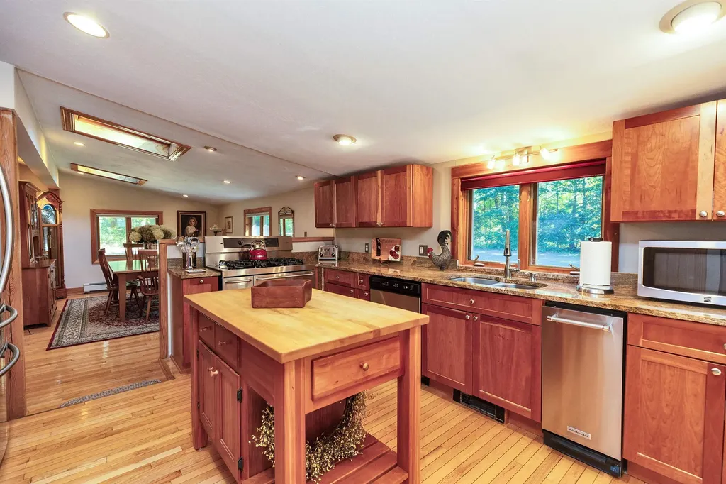 11 Charles Bancroft Highway Litchfield NH 03052