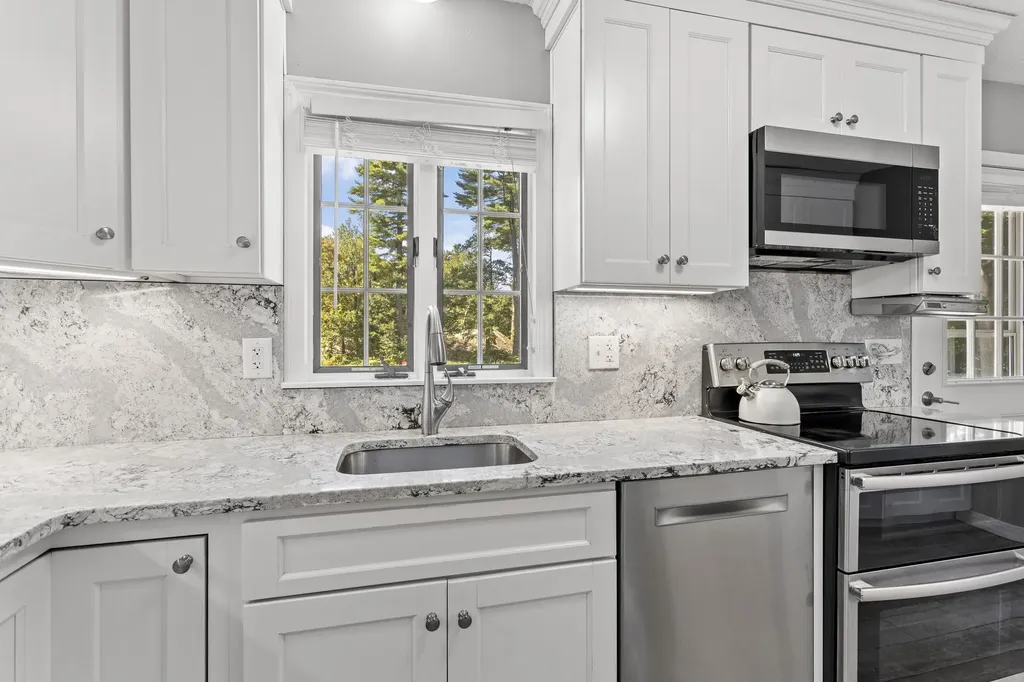 36 Charles Bancroft Highway Litchfield NH 03052