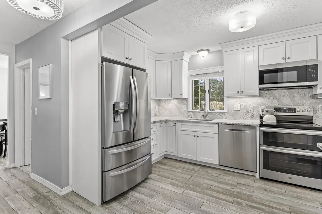 36 Charles Bancroft Highway Litchfield NH 03052