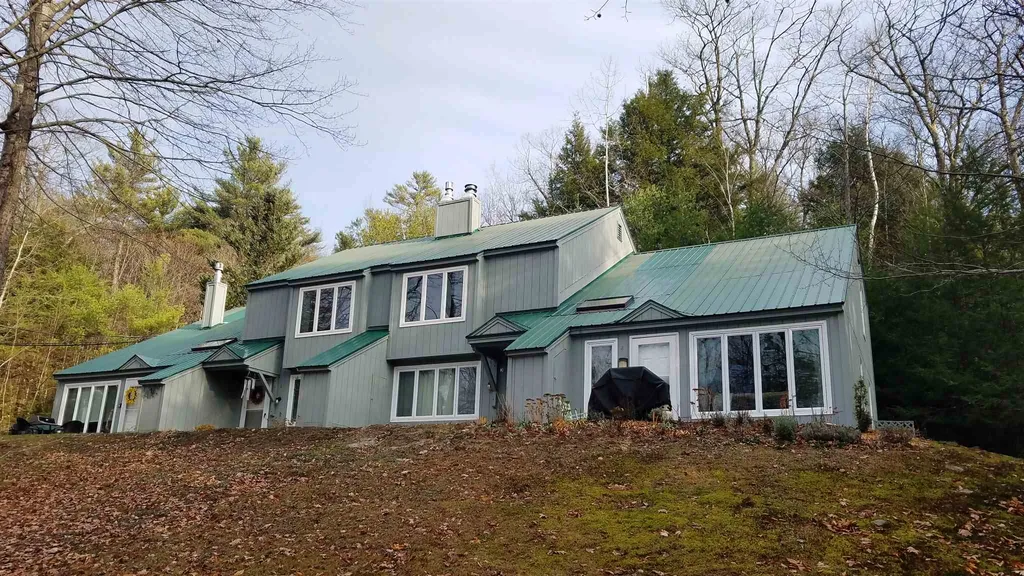 Exterior full building 37 River Run #3, Thornton, NH 03285 Alpine Lakes Real Estate