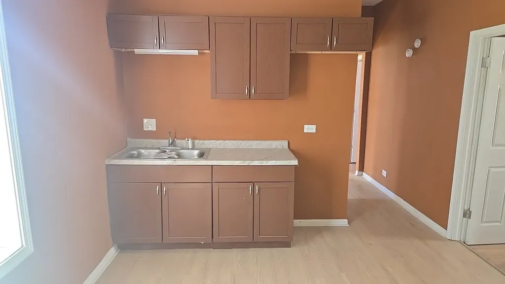 132 West 113th Street Chicago IL 60628