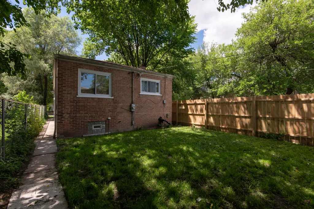 7737 South Champlain Avenue Chicago IL 60619
