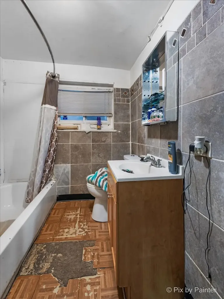 7030 South Artesian Avenue Chicago IL 60629