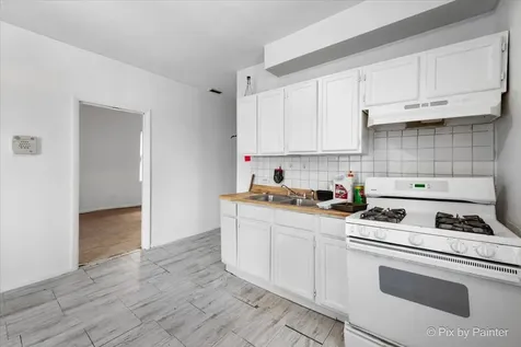 7030 South Artesian Avenue Chicago IL 60629
